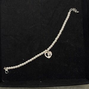 Elegant Pearl and Silver Heart Charm Bracelet